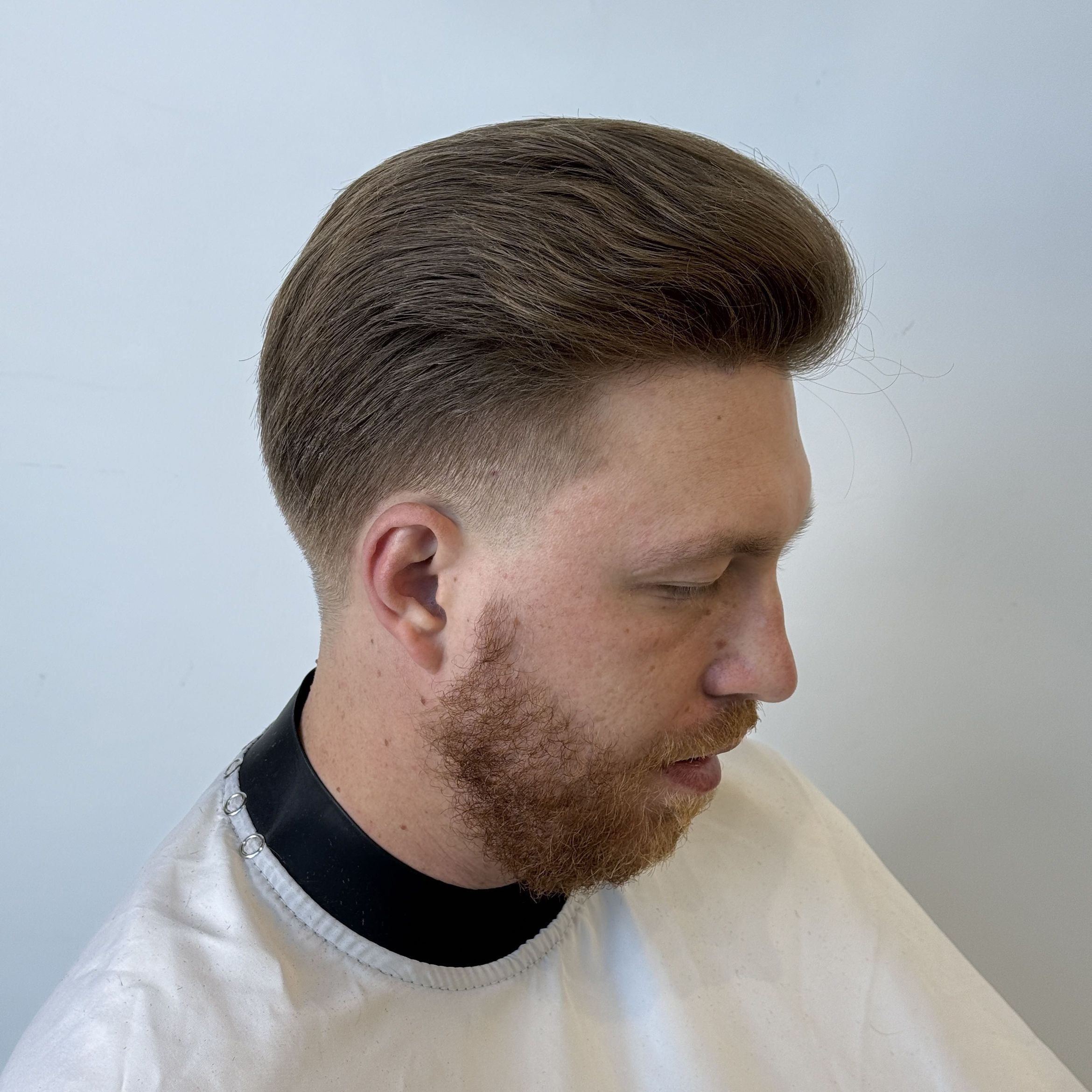 Strzyżenie długich włosów — praca barbershopu Fade House w Łodzi